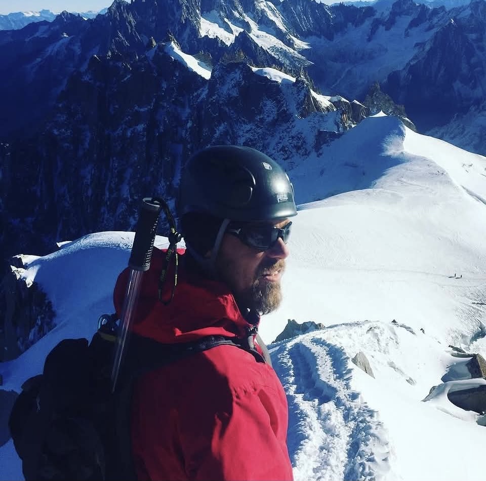 Portrait on a snowy summit ridge